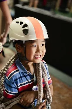 School-age children on the indoor play structure after school