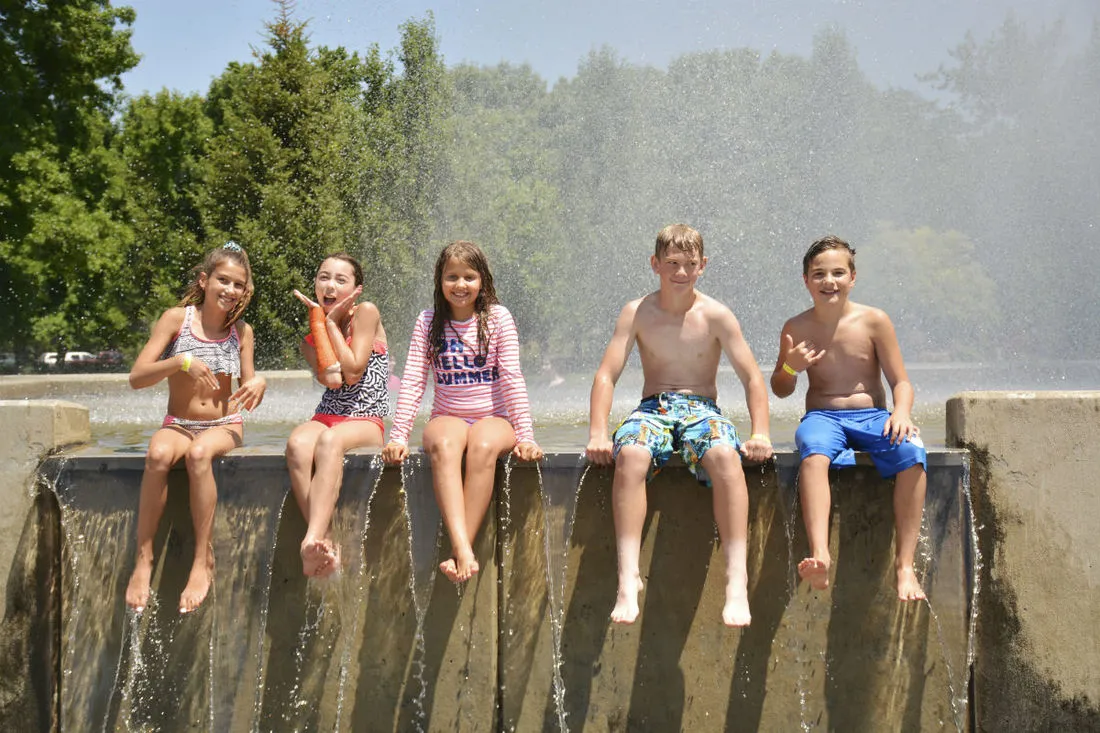 Campers cooling off during a splash day at camp