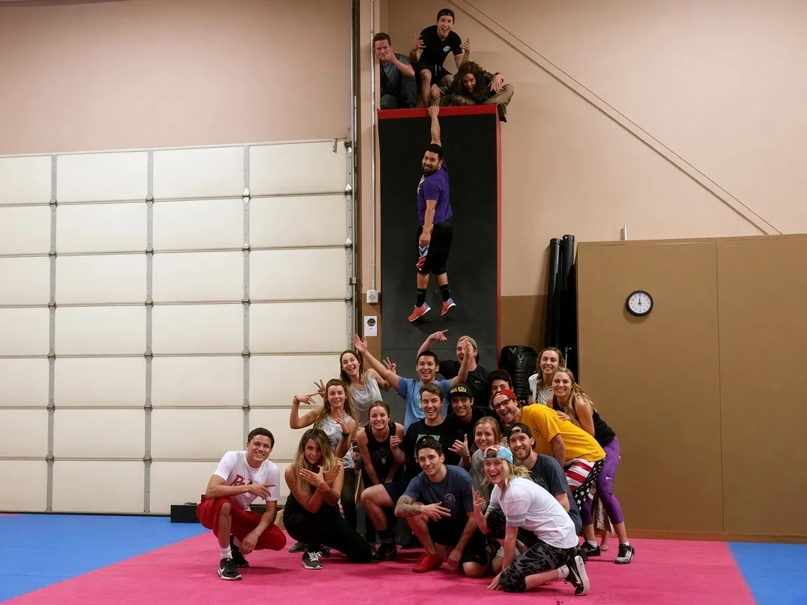 A team posing together at Bodies in Motion after a group challenge